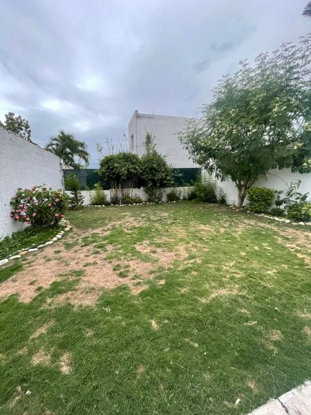 Casa con patio y habitaciones en planta baja en Unidad Nacional